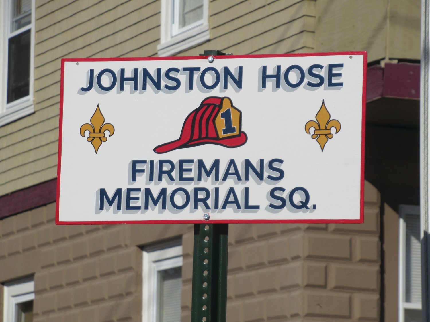 SPECIALTY SIGN: John Ermaian, popular and long-time owner of Ermaian Signs, donated this super sign that’s located at the upgraded memorial square in honor of all deceased firefighters who served the Johnston Fire Department.